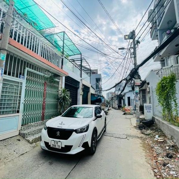 Nhà 4 tầng hẻm xe hơi 803 Huỳnh Tấn Phát 7m x 17m