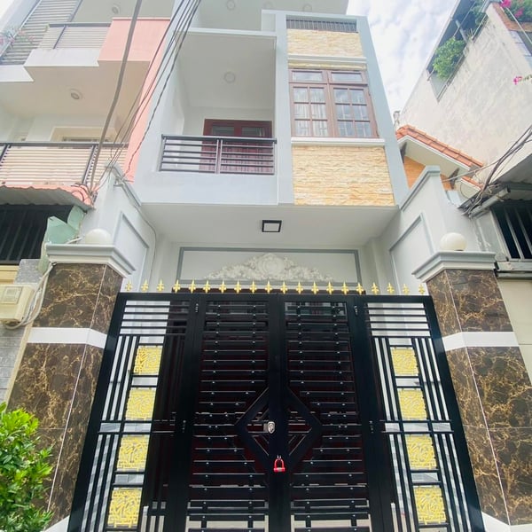 Nhà 4 tầng hẻm xe hơi 803 Huỳnh Tấn Phát 4m x 16m