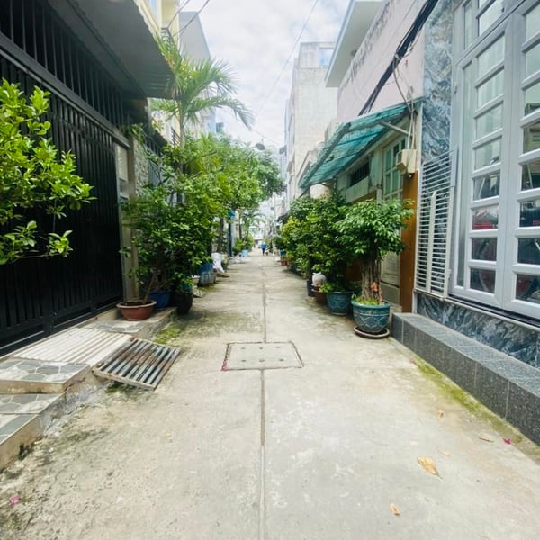 Nhà 4 tầng hẻm xe hơi 803 Huỳnh Tấn Phát 4m x 16m