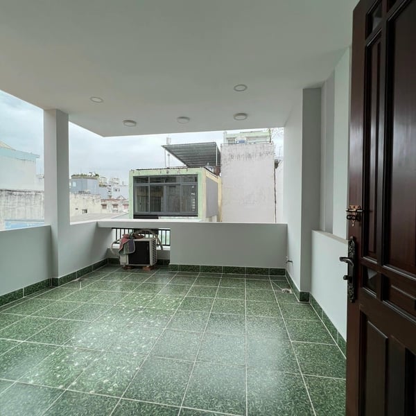 Nhà 4 tầng hẻm xe hơi 803 Huỳnh Tấn Phát 4m x 16m