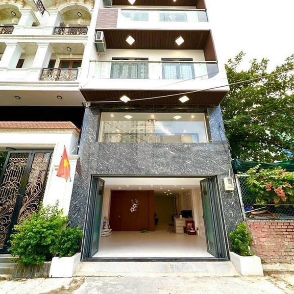 Nhà 5 tầng hẻm xe hơi Huỳnh Tấn Phát 5,5m x 14m