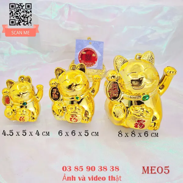 Con mèo ngoắc tay túi vàng tài lộc