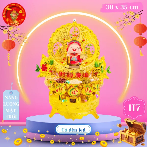 Tháp tỏi chưng ông Địa Thần Tài đứng trên thỏi vàng năng lượng có đèn