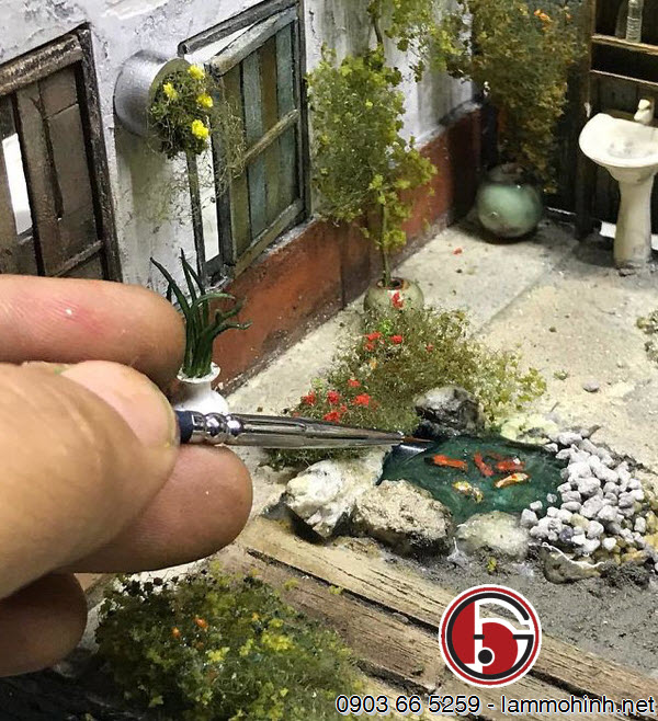 Các vật liệu làm mô hình kiến trúc của Eddie bao gồm gỗ mềm, polystyrene, tấm ván, đất sét và thậm chí cả tro thuốc lá và ống khói Các vật liệu làm mô hình kiến trúc của Eddie bao gồm gỗ mềm, polystyrene, tấm ván, đất sét và thậm chí cả tro thuốc lá và ống khói