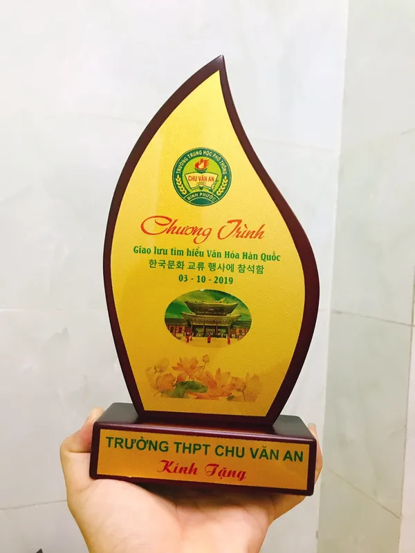 Kỷ niệm chương gỗ hình chiếc lá, ngọn lửa