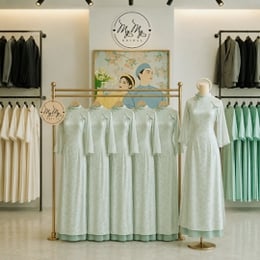 ÁO DÀI BƯNG QUẢ NỮ XANH HỌA TIẾT HOA VÀ BƯỚM
