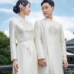 ÁO DÀI CẶP TRẮNG CHỮ HỶ KẾT HOA NHÍ