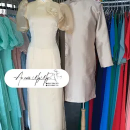 ÁO DÀI BƯNG QUẢ CẶP BE TAY BỒNG