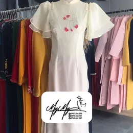 ÁO DÀI BƯNG QUẢ NỮ KEM HOA ĐỎ