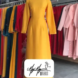 ÁO DÀI BƯNG QUẢ NỮ VÀNG ĐỒNG TRUYỀN THỐNG