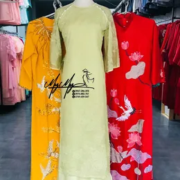 ÁO DÀI BƯNG QUẢ NỮ XANH HOA HỒNG