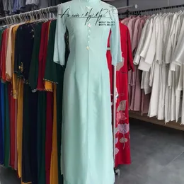 ÁO DÀI BƯNG QUẢ NỮ XANH MINT XẺ TÀ