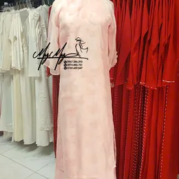 ÁO DÀI BƯNG QUẢ NỮ HỒNG HỒ ĐIỆP