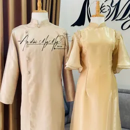 ÁO DÀI BƯNG QUẢ CẶP BE TAY CÁNH TIÊN