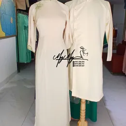 ÁO DÀI BƯNG QUẢ CẶP KEM PHỐI XANH