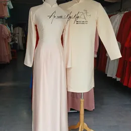 ÁO DÀI BƯNG QUẢ CẶP MÀU KEM