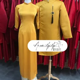 ÁO DÀI BƯNG QUẢ CẶP VÀNG ĐỒNG TRUYỀN THỐNG