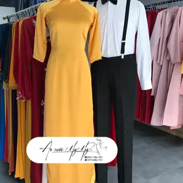 ÁO DÀI BƯNG QUẢ CẶP VÀNG ĐỒNG TRUYỀN THỐNG VÀ ĐAI CHỮ Y