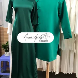 ÁO DÀI BƯNG QUẢ CẶP XANH LÁ TRUYỀN THỐNG