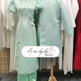 ÁO DÀI BƯNG QUẢ CẶP XANH BA GIỌT NƯỚC