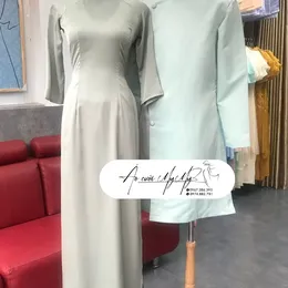 ÁO DÀI BƯNG QUẢ CẶP XANH MINT TRUYỀN THỐNG