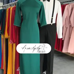 ÁO DÀI BƯNG QUẢ CẶP XANH LÁ VÀ ĐAI CHỮ Y