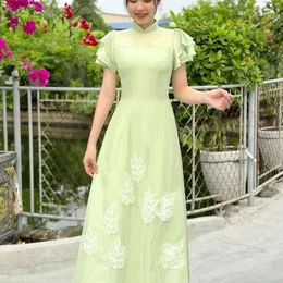 ÁO DÀI BƯNG QUẢ NỮ XANH KẾT CÀNH LIỄU