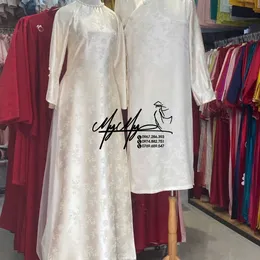 ÁO DÀI CẶP TRẮNG GẤM TRÚC ĐÀO