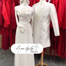 ÁO DÀI CƯỚI CẶP TRẮNG KẾT PHỤNG VÀ HOA NỔI