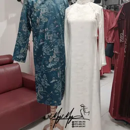ÁO DÀI CƯỚI CẶP XANH TRẮNG HỌA TIẾT THỦY MẶC