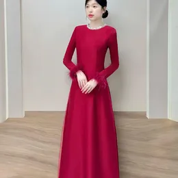 ÁO DÀI CÔ DÂU ĐỎ CỔ TRÒN TAY KẾT LÔNG VŨ