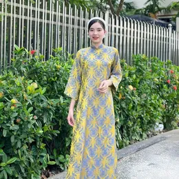 ÁO DÀI NỮ VÀNG TAY LOE PHOM SUÔNG