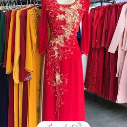ÁO DÀI SUI ĐỎ ĐÍNH KẾT HOA VÀNG