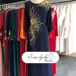 ÁO DÀI BÀ SUI XANH ĐÍNH KẾT HOA VÀ HẠT PHA LÊ