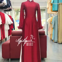 ÁO DÀI CÔ DÂU ĐỎ TAY KẾT LÔNG VŨ