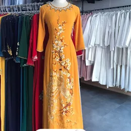 ÁO DÀI SUI VÀNG THÊU CÔNG