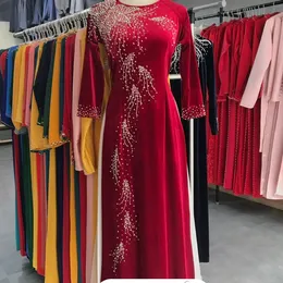 ÁO DÀI BÀ SUI ĐỎ ĐÍNH KẾT HOA VAI