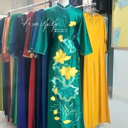 ÁO DÀI BÀ SUI XANH THÊU HOA SEN VÀNG NỔI BẬT