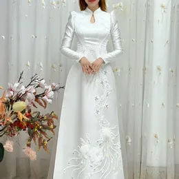 ÁO DÀI CÔ DÂU TRẮNG KẾT LÔNG VŨ