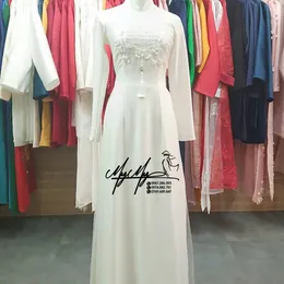 ÁO DÀI CÔ DÂU TRẮNG CHỮ HỶ VÀ HOA
