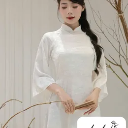 ÁO DÀI CÔ DÂU TRẮNG HỌA TIẾT THỦY MẶC
