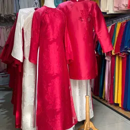 ÁO DÀI CƯỚI CẶP ĐỎ HỌA TIẾT HOA HỒNG