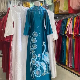 ÁO DÀI BÀ SUI XANH THÊU HOA CHIM CÔNG VÀ HOA BỒ CÔNG ANH