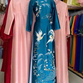 ÁO DÀI BÀ SUI XANH THÊU HẠC VÀ TÙNG