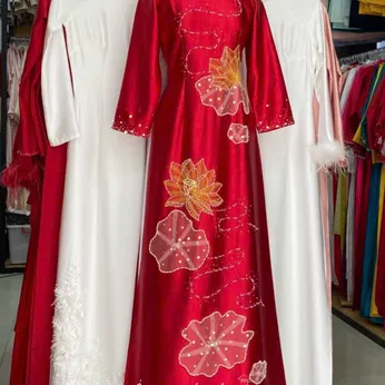 ÁO DÀI BÀ SUI ĐÍNH KẾT HOA SEN VÀNG