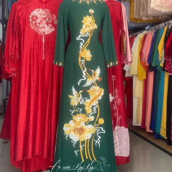 ÁO DÀI BÀ SUI XANH VE THÊU HOA SEN VÀNG