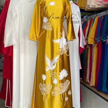 ÁO DÀI BÀ SUI VÀNG THÊU HOA SEN VÀ CHIM HẠC