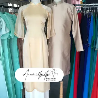 ÁO DÀI BƯNG QUẢ CẶP BE TAY LOE