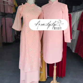 ÁO DÀI BƯNG QUẢ CẶP HỒNG TAY LOE IN HOA