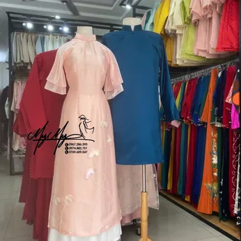 ÁO DÀI BƯNG QUẢ CẶP HỒNG VÀ XANH KẾT HOA NỔI